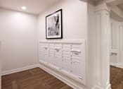Thumbnail 22 of 54 - a row of white chests of drawers in a white room