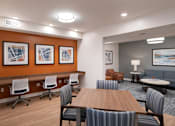 Thumbnail 19 of 54 - a conference room with a table and chairs