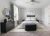 Thumbnail 1 of 37 - A bedroom with a large bed, a dresser, and a mirror.