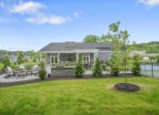 Thumbnail 67 of 74 - a backyard with a pool and a house