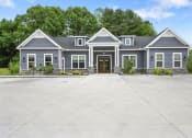Thumbnail 72 of 74 - a large driveway in front of a clubhouse