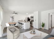 Thumbnail 8 of 18 - A modern living room with a grey sofa, a grey armchair, a white coffee table, a white dining table, a white kitchen, a white ceiling fan, a white rug, a white wall, a white door, a