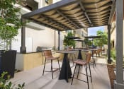 Thumbnail 16 of 27 - Outdoor Grill With Intimate Seating Area at Citron Apartment Homes, Riverside, CA