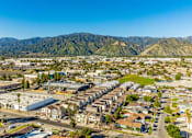 Thumbnail 15 of 27 - A suburban area with a mountain range in the background.