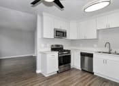 Thumbnail 7 of 10 - Orangewood Garden Apartment Homes in Anaheim kitchen