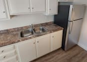 Thumbnail 17 of 24 - Stainless steel appliances at Huntington Cove Apartment Homes in Huntington Beach