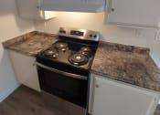 Thumbnail 19 of 24 - Stainless steel appliances at Huntington Cove Apartment Homes in Huntington Beach