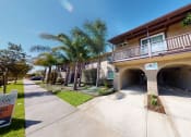 Thumbnail 8 of 24 - Swimming Pool and Spa at Huntington Cove Apartment Homes in Huntington Beach, California.