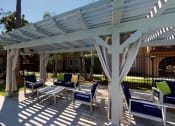 Thumbnail 7 of 24 - Swimming Pool and Spa at Huntington Cove Apartment Homes in Huntington Beach, California.