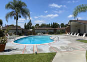 Thumbnail 2 of 10 - Orangewood Garden Apartment Homes in Anaheim Swimming Pool