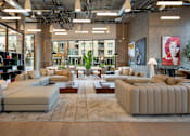 Thumbnail 2 of 29 - A large, modern living room with a variety of seating options and a view of the city.