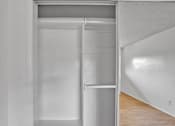 Thumbnail 9 of 13 - A white refrigerator with a shelf and a door open.