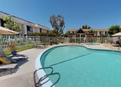 Thumbnail 4 of 14 - our apartments have a large pool with chairs and umbrellas