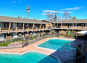 Thumbnail 6 of 32 - Towne Centre at Orange Apartments with swimming pool.