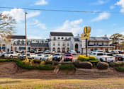 Thumbnail 21 of 22 - parking lot with cars at Eastover Commons Residential, Jackson, MS 39216  