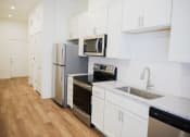 Thumbnail 13 of 41 - Jr Bedroom Unit Kitchen at The Quarter House, Mississippi