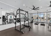 Thumbnail 17 of 22 - gym with a variety of equipment at Eastover Commons Residential, Jackson Mississippi
