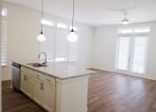 Thumbnail 16 of 41 - Two Bedroom Unit Kitchen and Living Area at The Quarter House, Jackson, 39216
