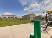 Thumbnail 12 of 29 - Dog Park with Seating and Water Station at Pillar Lago