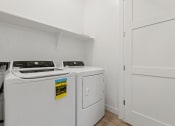 Thumbnail 28 of 31 - Laundry  at Village of Chandler Apartments, Chandler, AZ, 85249
