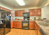 Thumbnail 13 of 48 - modern finishes with wood cabinets