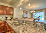 Thumbnail 16 of 48 - kitchen overlooks dining room area