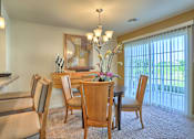 Thumbnail 12 of 48 - large dining area with sliding glass doors