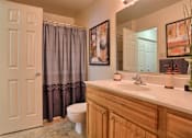 Thumbnail 12 of 41 - large bath with wood vanity