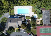 Thumbnail 30 of 41 - aerial of tennis court, clubhouse and pool