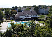 Thumbnail 29 of 41 - aerial of clubhouse and pool