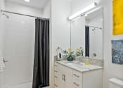 Thumbnail 23 of 24 - Bathtub and vanity at The Freelon at Sugar Hill, Detroit, Michigan, 48201