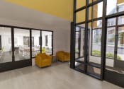 Thumbnail 3 of 10 - a living room with yellow chairs and a glass door