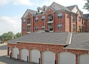 Thumbnail 10 of 26 - Luxury apartments with red brick exterior, garages available, and scenic views in Minnetonka, Minnesota
