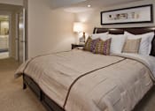 Thumbnail 38 of 41 - Huge master bedroom with attached walk-in closet and master bathroom, spacious master bedroom at Embassy Park Apartments in Omaha, Nebraska