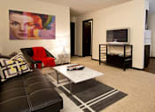 Thumbnail 6 of 27 - Apartments in central Omaha with spacious living room and dining room at Kensington Woods Apartments