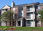 Thumbnail 3 of 30 - Apartments with beautiful landscaping, park-like setting, lots of trees, and scenic views at The Vanderbilt Apartments in Omaha, Nebraska