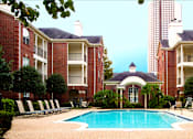 Thumbnail 1 of 20 - Luxury swimming pool with large sundeck at Tuscany Gate Apartments in Houston.