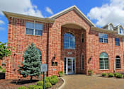 Thumbnail 16 of 38 - Luxury apartments with red brick exterior and lush landscaping at TurtleCreek apartments in West Des Moines, Iowa
