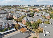 Thumbnail 36 of 73 - Gated luxury apartment community in north Dallas with red brick exteriors at The Saxony Apartments
