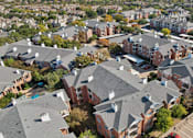 Thumbnail 9 of 73 - Gated luxury apartment community in north Dallas with red brick exteriors at The Saxony Apartments