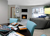 Thumbnail 1 of 30 - Spacious floor plan, open floor plan, spacious apartment with woodburning fireplace, spacious kitchen, spacious dining room, and bright white kitchen at The Vanderbilt Apartments in Omaha, Nebraska