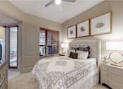 Thumbnail 30 of 42 - Luxury apartments with spacious master bedroom to accommodate a king-size bed and dresser with walk-in closet and master bathroom at Tuscany Walk Apartments in Houston Texas.