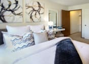 Thumbnail 13 of 44 - Spacious master bedroom with attached walk-in closet and master bathroom at Tanglewood Apartments in Lincoln, Nebraska