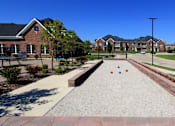Thumbnail 35 of 46 - Luxury apartments with swimming pool, poolside lounges, grilling station, ping-pong table, and bocce ball court, and brick exteriors at Bellemeade Apartments in west Des Moines