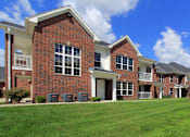 Thumbnail 28 of 46 - Luxury townhomes with attached garages and red brick exteriors at Bellemeade Apartments in west Des Moines