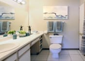 Thumbnail 8 of 44 - Spacious bathroom with extra cabinet space, built-in vanity, and tiled floor and shower at Tanglewood Apartments in Lincoln, Nebraska
