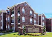 Thumbnail 2 of 31 - Luxury apartments located next to Rockledge shopping center with red brick exterior and scenic views
