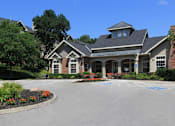 Thumbnail 3 of 35 - Clubhouse and lush landscaping at Breckenridge Apartments in southwest Omaha, Nebraska