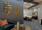 Thumbnail 24 of 44 - Modern resident lounge with free wi-fi, resident cyber lounge, resident cyber café at Tanglewood Apartments in Lincoln, Nebraska