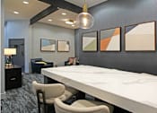 Thumbnail 36 of 44 - Clubhouse with resident lounge, resident cyber café, free wi-fi, and 24-hour fitness center at Tanglewood Apartments located near the University of Nebraska Lincoln